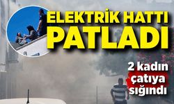 Elektrik hattı patladı, çıkan yangında 2 kişi mahsur kaldı