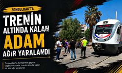 Trenin altında kalan adam ağır yaralandı