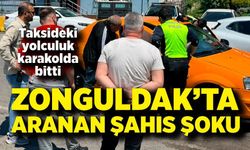 Aranan şahıs takside yolcu taşırken yakalandı