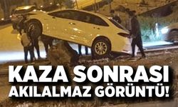 Kaza sonrası akılalmaz görüntü! Otomobil havada asılı kaldı