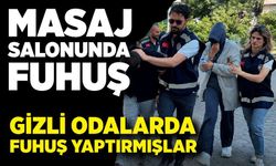 Masaj salonunda gizli odalarda fuhuş yaptırmışlar