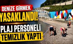 Denize girmek yasaklandı, plaj personeli temizlik yaptı
