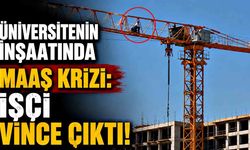 Üniversitenin ek bina inşaatında maaş krizi: İşçi vince çıktı