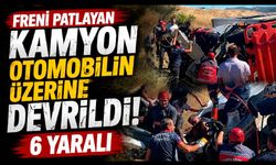 Freni patlayan şeftali yüklü kamyon, otomobilin üzerine devrildi: 6 yaralı