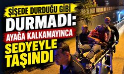 Şişede durduğu gibi durmadı: Ayağa kalkamayınca sedyeyle taşındı