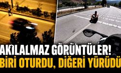 Akıl almaz görüntüler! Biri oturdu, diğeri yürüdü