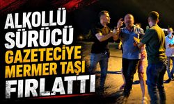 Alkollü sürücü gazeteciye mermer taşı fırlattı