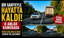 Otomobil kamyonla kafa kafaya çarpışmaktan son anda kurtuldu