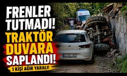Frenler tutmayan traktör duvara saplandı