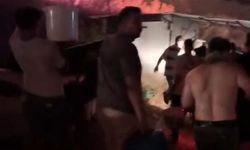 Eline kovaları alan yangına koştu
