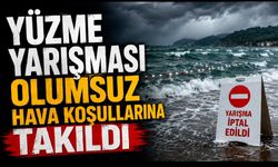 Yüzme yarışması olumsuz hava koşullarına takıldı