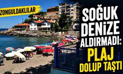 Zonguldaklılar soğuk denize aldırmadı: Plaj dolup taştı