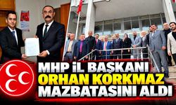 MHP İl Başkanı Orhan Korkmaz mazbatasını aldı