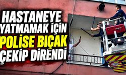 Hastaneye yatmamak için polise bıçak çekip direndi