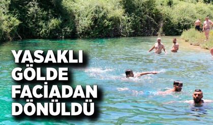 Yasaklı gölette facianın eşiğinden dönüldü