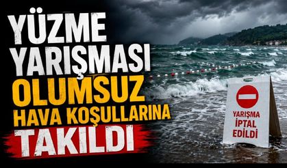 Yüzme yarışması olumsuz hava koşullarına takıldı