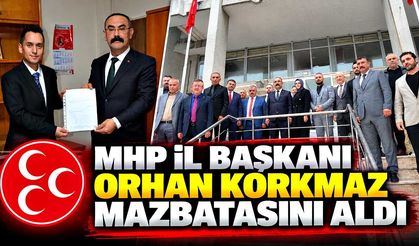 MHP İl Başkanı Orhan Korkmaz mazbatasını aldı
