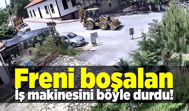 Freni boşalan iş makinesini durdurma anı güvenlik kamerasında!