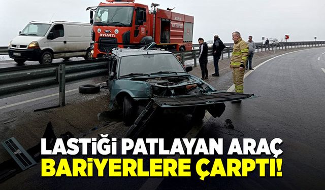 Lastiği patlayan araç bariyerlere çarptı!