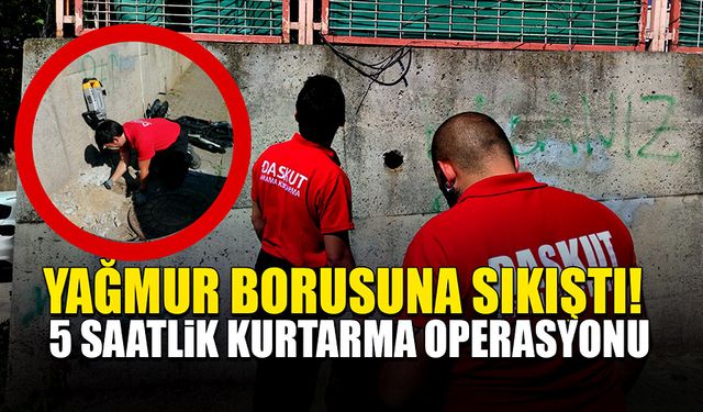 Yağmur giderine sıkışan kedi 5 saatlik operasyonla kurtarıldı