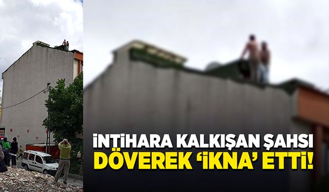 İntihara kalkışan genci döverek zorla aşağıya indirdi!