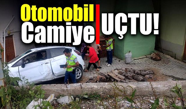 Otomobil cami bahçesine düştü!