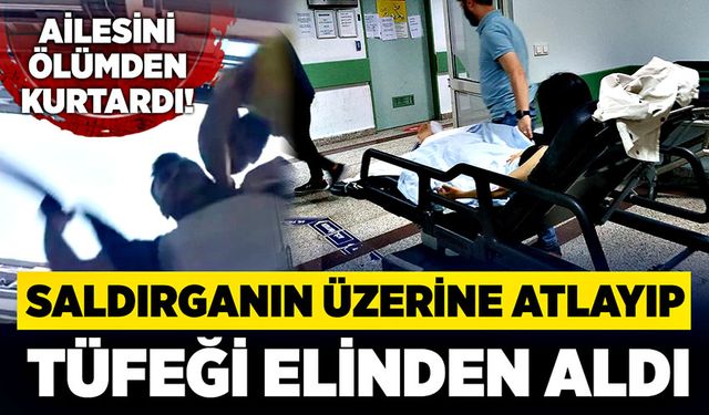 Saldırganın üzerine atlayıp tüfeği elinden aldı!