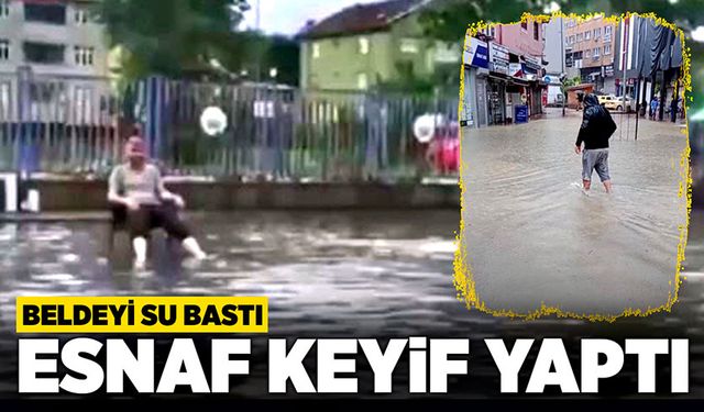 Beldeyi su bastı: Esnaf keyif yaptı