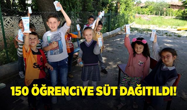 150 öğrenciye süt dağıttılar ve çocukları eğlendirdiler