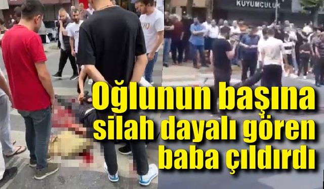 Oğlunun başına silah dayalı gören baba çıldırdı