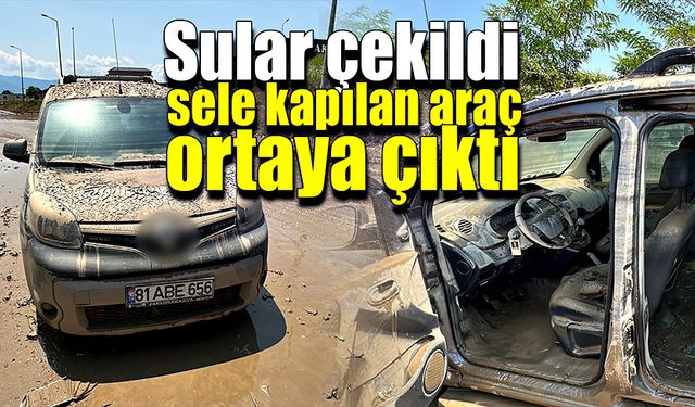 Sular çekilince ortaya çıkan araba kullanılamaz halde!