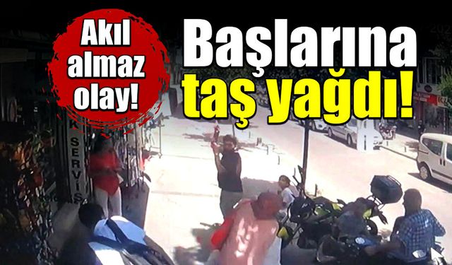 Kaldırımda yürürlerken başlarına taş yağdı!