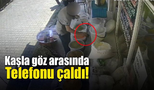 Kaşla göz arasında tezgahta bulunan telefonu çaldı!