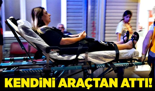 Kendini araçtan attı!