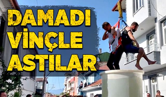 Damadı vinçle astılar!