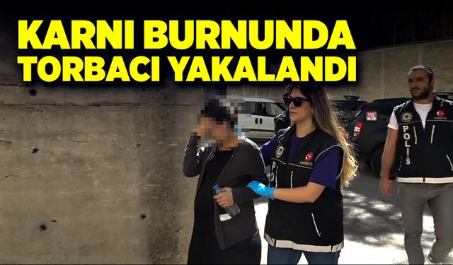 Karnı burnunda torbacı polis tarafından yakalandı