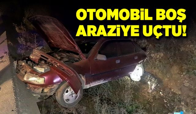 Kontrolden çıkan otomobil boş araziye uçtu!