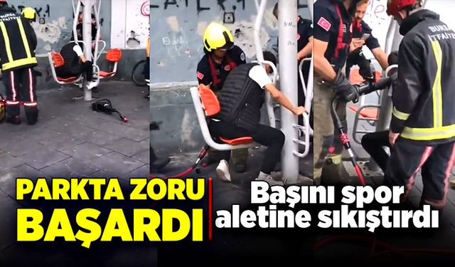 Parkta zoru başardı ve başını spor aletine sıkıştırdı