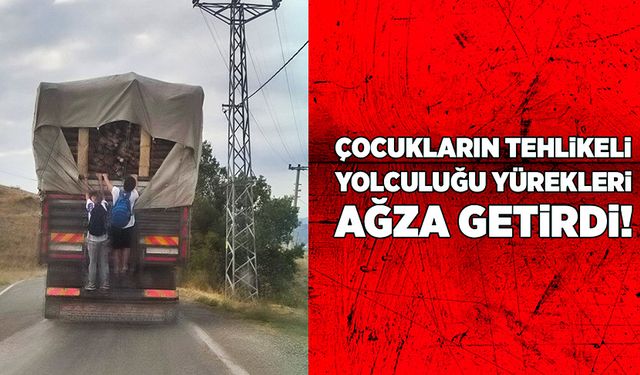 Odun yüklü kamyonun arkasına asılan çocuklar yürekleri ağza getirdi!