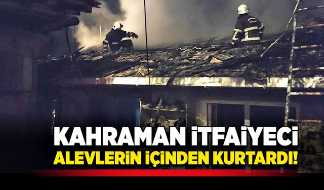 Kahraman itfaiyeci, alevlerin içinden kurtardı!