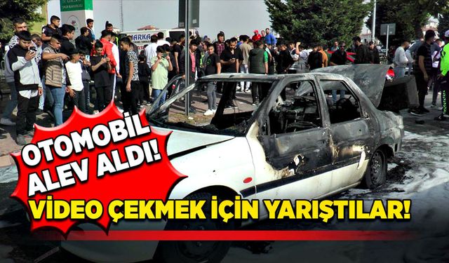 Otomobil alev aldı! Video çekmek için yarıştılar!