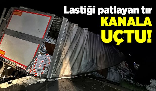 Lastiği patlayan tır kanala uçtu!