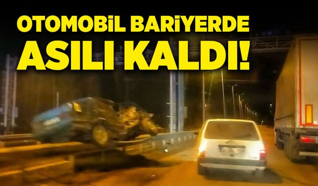 Kastamonu'da otomobil, bariyerde asılı kaldı!