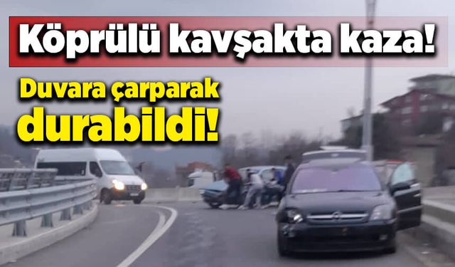 Köprülü kavşakta kaza! Duvara çarparak durabildi!