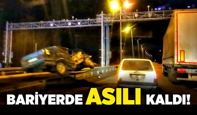 Bariyerde asılı kaldı!