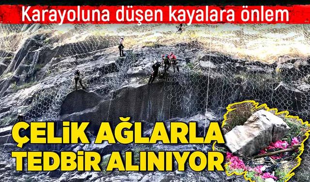 Karayoluna düşen kayalara önlem için çelik ağlarla tedbir alınıyor