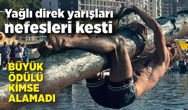 Yağlı direk yarışları nefesleri kesti, büyük ödülü kimse alamadı