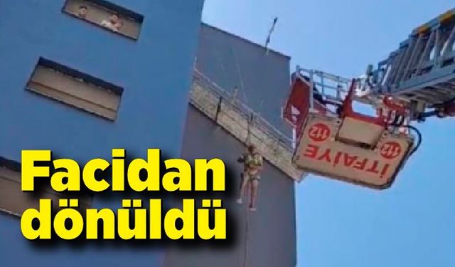 Halatı kopan iskelede asılı kalan işçiyi itfaiye kurtardı