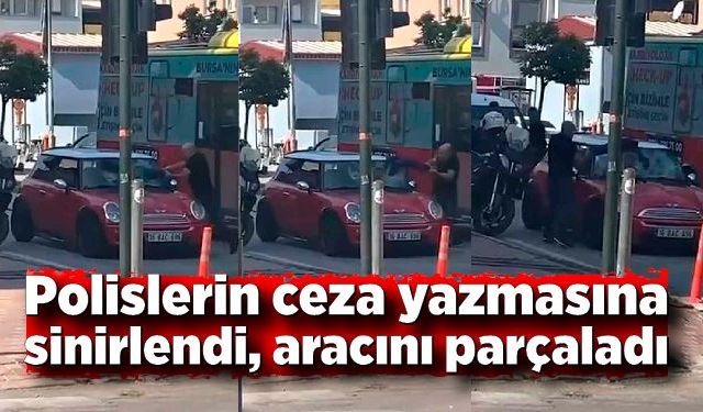 Polislerin ceza yazmasına sinirlendi, aracını parçaladı