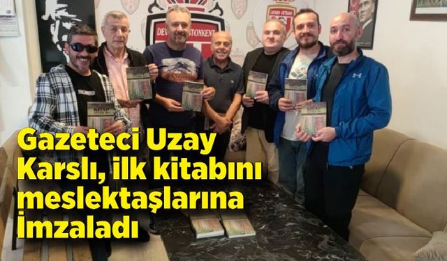 Gazeteci Uzay Karslı, ilk kitabını meslektaşlarına İmzaladı